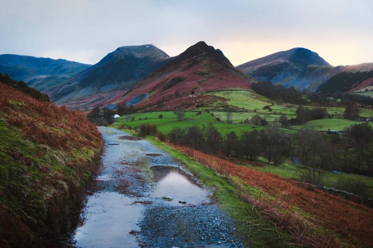 English countryside stream with mountains, via unsplash